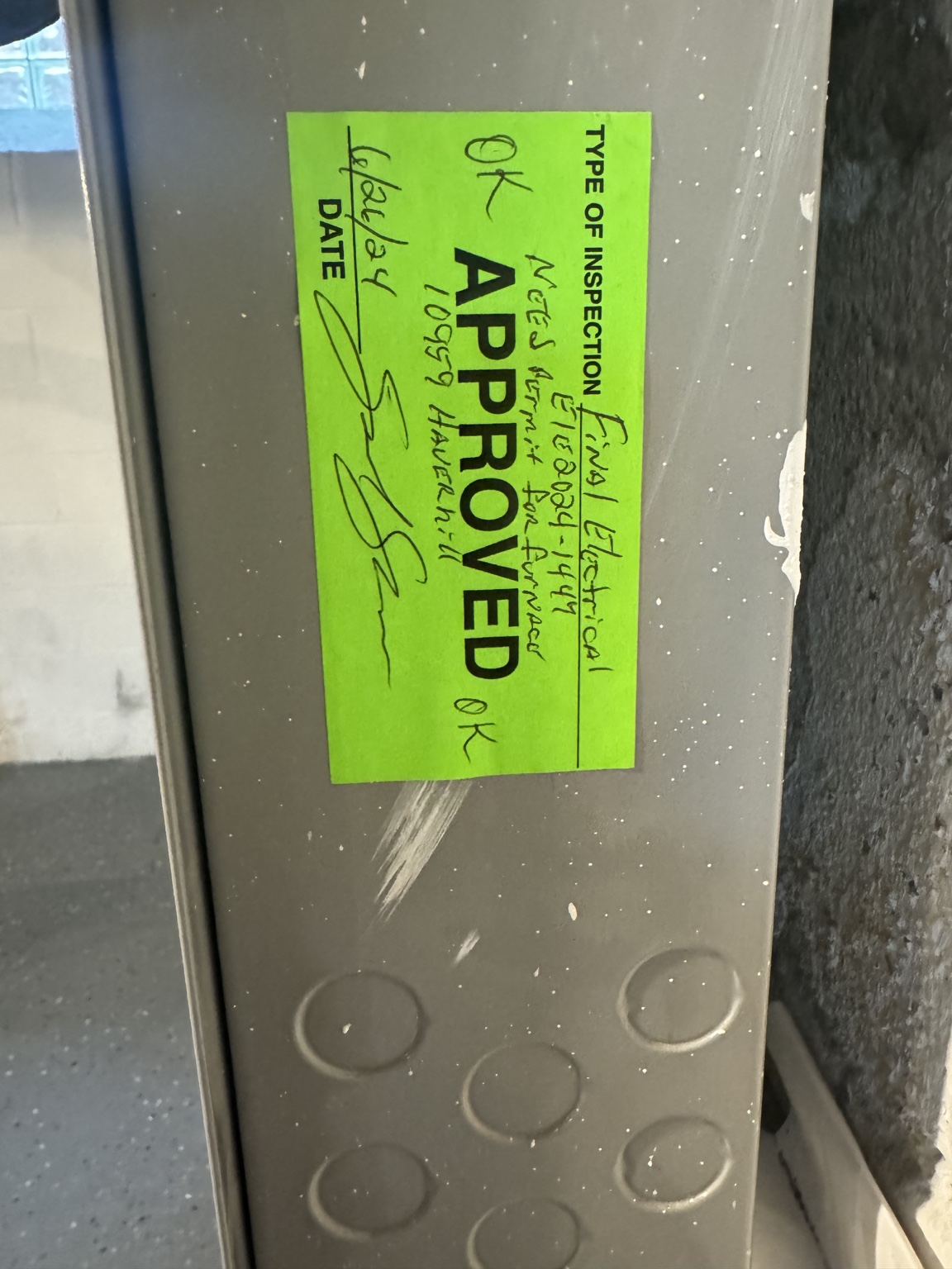 Final electrical approval sticker on panel