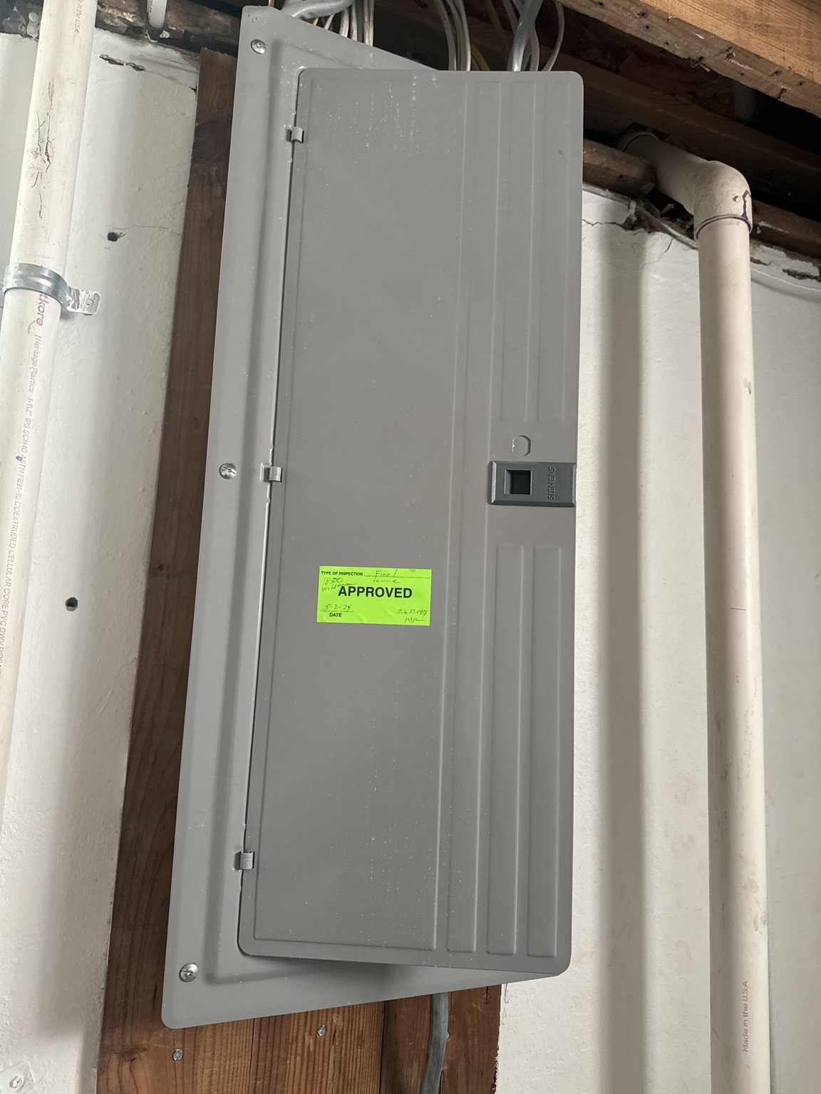 Approved inspection sticker on completed service panel