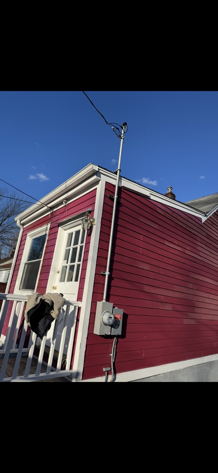 Electrical service mast and meter