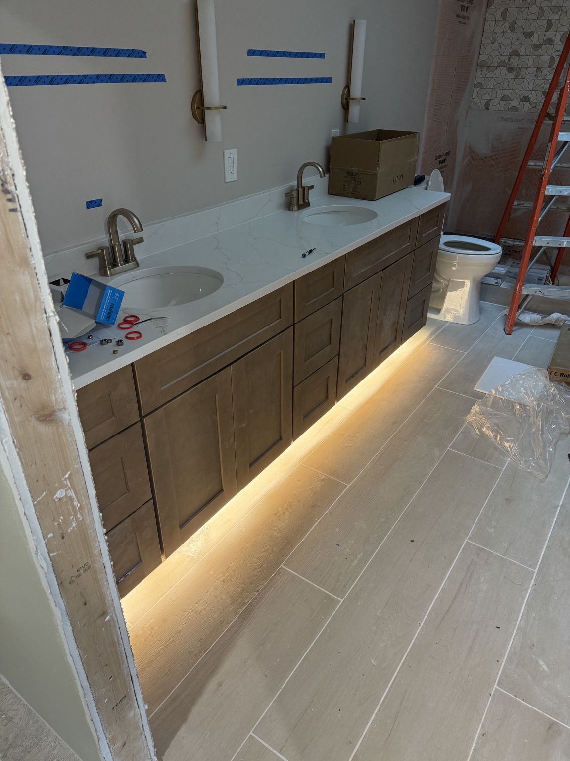 Bathroom vanity and under-cabinet lighting installation